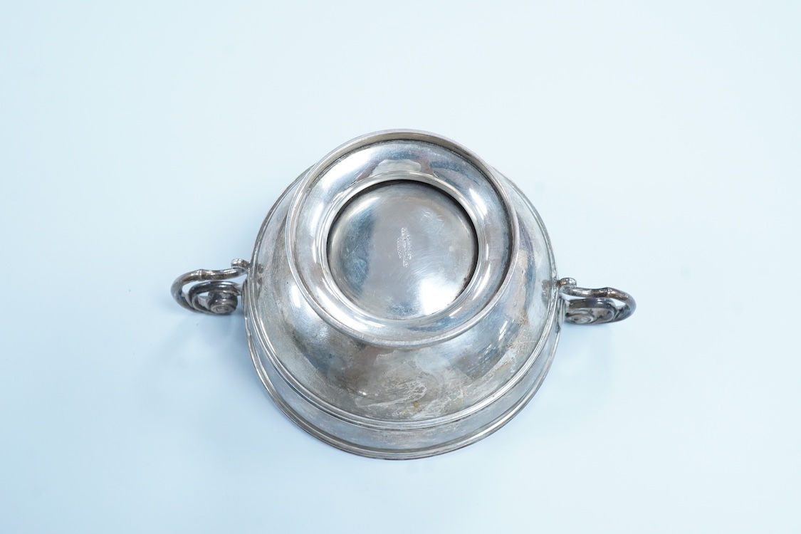 An Edwardian silver two handled pedestal bowl, by Lambert & Co, London, 1909, with later engraved inscription, diameter 10.5cm excluding the handles, 7.2oz.